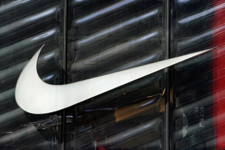 FILE PHOTO: The Nike swoosh logo is seen outside the store on 5th Avenue in New York, New York, U.S., March 19, 2019. REUTERS/Carlo Allegri